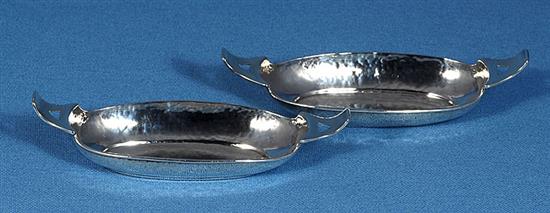 A pair of Edwardian Arts & crafts silver oval navette shaped dishes, by Liberty & Co, Length 139mm, weight 2.8oz/90grms